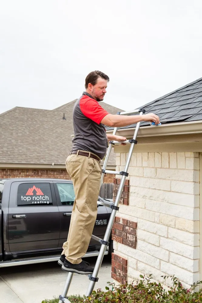 Slide of Top Notch Roofing