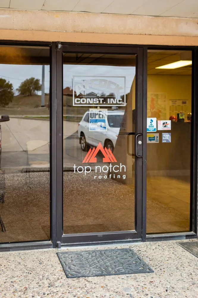 Slide of Top Notch Roofing