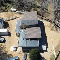 Slide of Top Notch Roofing