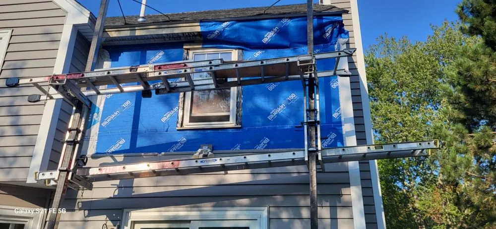 Slide of Top Notch Roofing