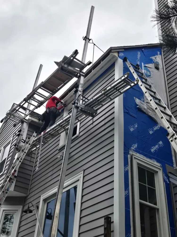 Slide of Top Notch Roofing