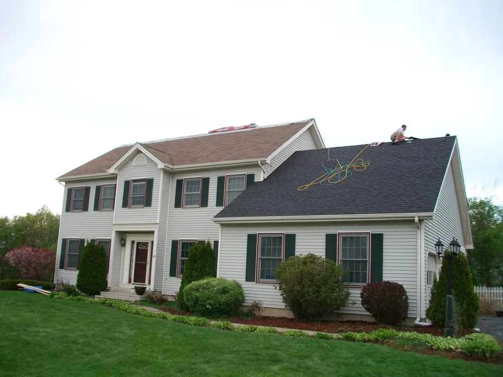 Slide of Top Notch Roofing