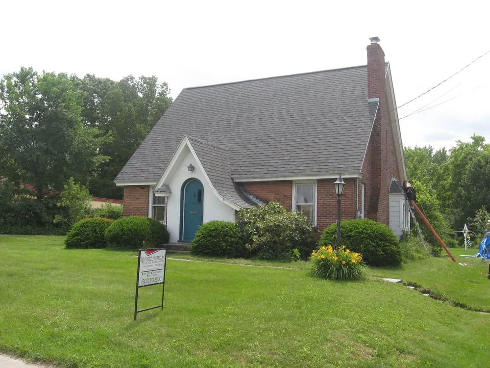 Slide of Top Notch Roofing