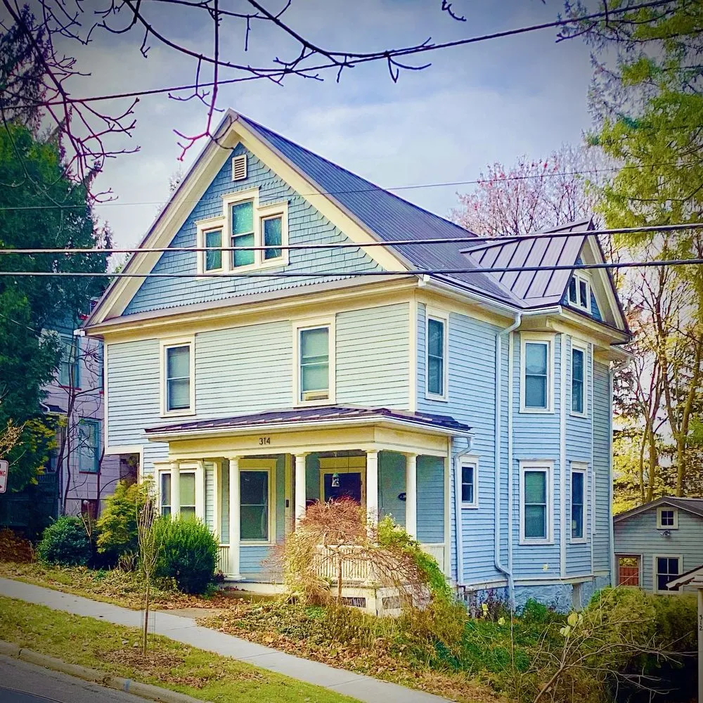 Slide of Top Notch Roofing Pros