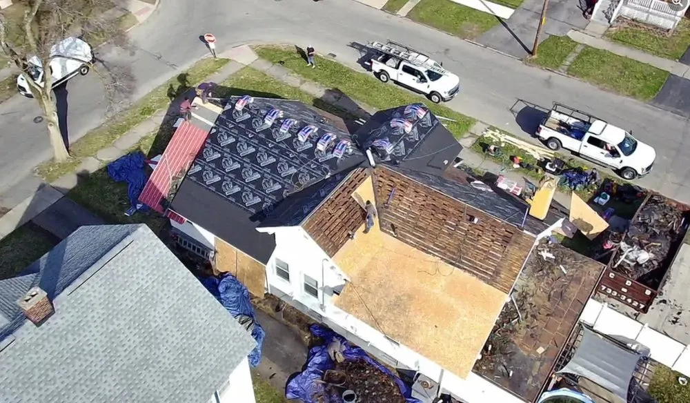 Slide of Top Notch Roofing Pros