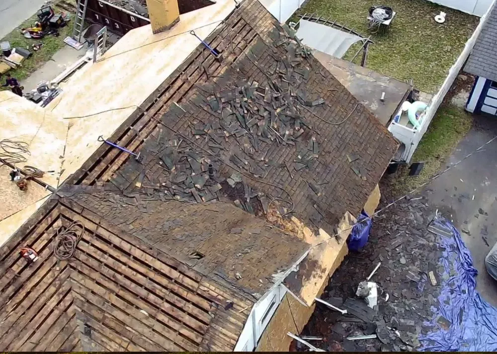 Slide of Top Notch Roofing Pros