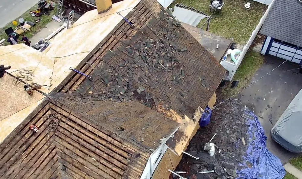 Slide of Top Notch Roofing Pros