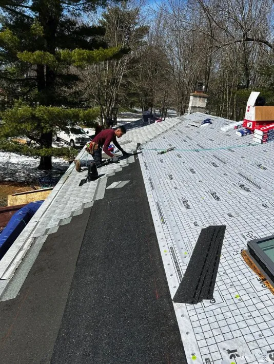 Slide of Top Notch Roofing Pros