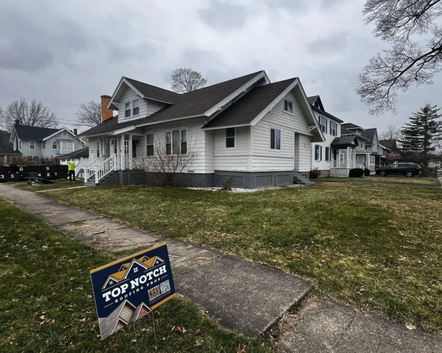 Slide of Top Notch Roofing Pros