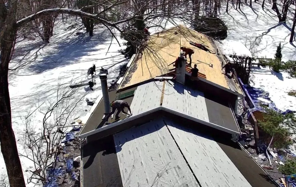 Slide of Top Notch Roofing Pros