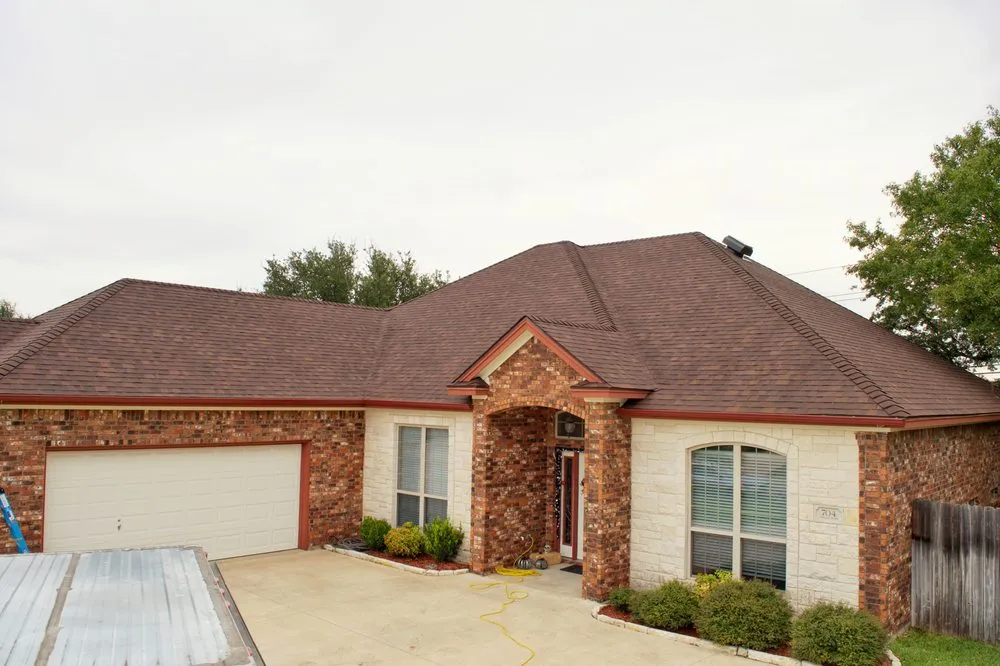 Slide of Top Notch Roofing