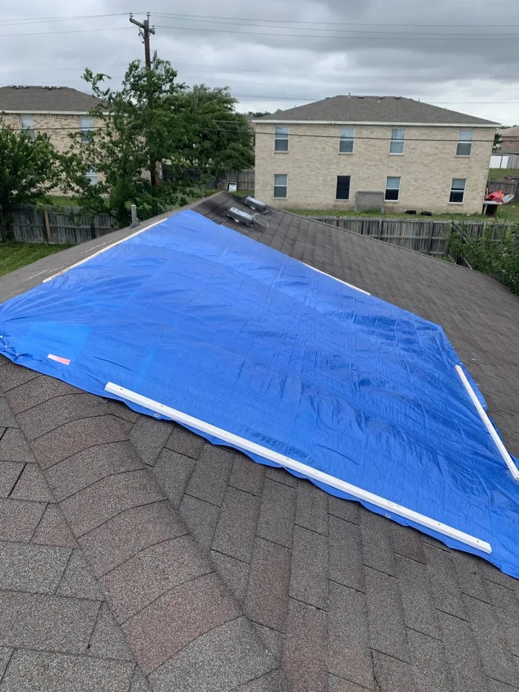 Slide of Top Notch Roofing