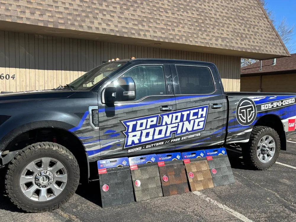 Slide of Top Notch Roofing