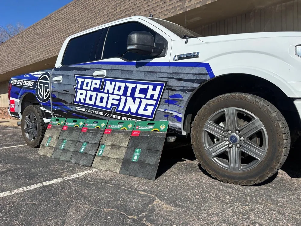 Slide of Top Notch Roofing