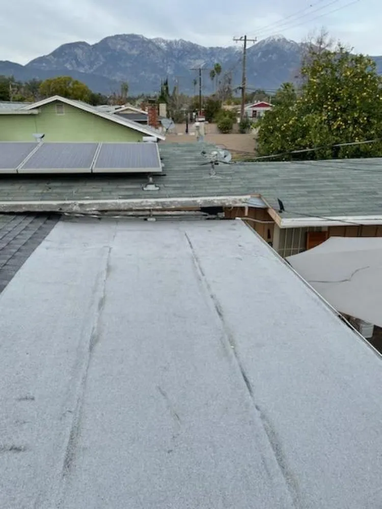 Slide of Top Of The Line Roofing