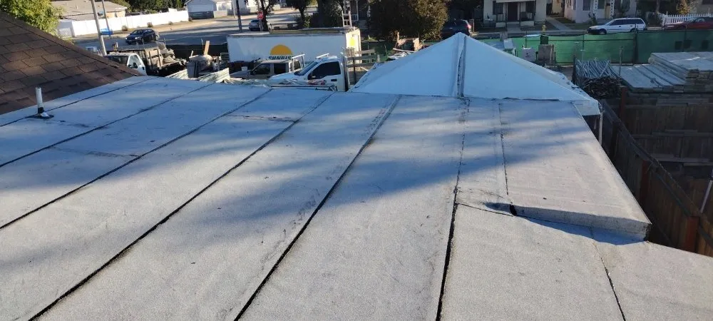 Slide of Top Of The Line Roofing