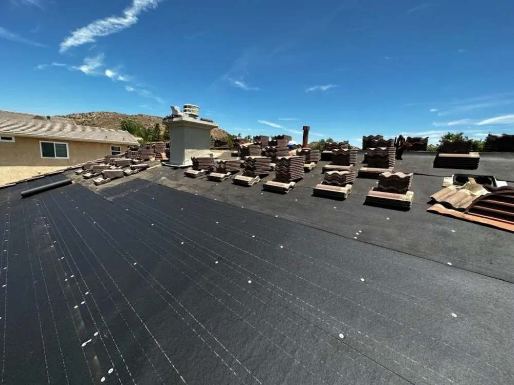 Slide of Top Of The Line Roofing