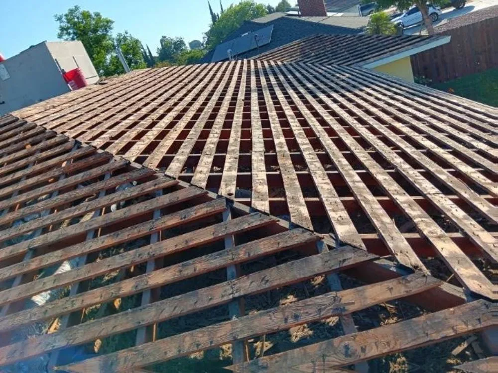 Slide of Top Of The Line Roofing