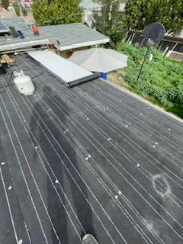 Slide of Top Of The Line Roofing