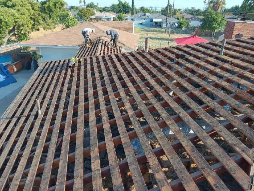 Slide of Top Of The Line Roofing