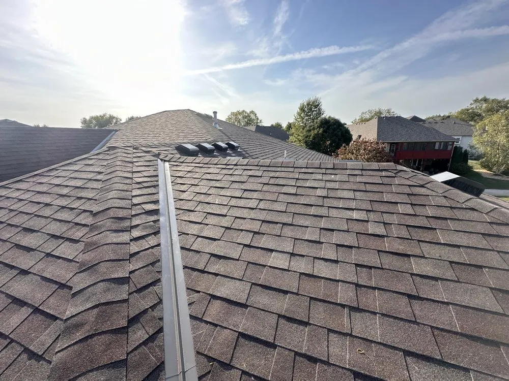 Slide of Top Peaks Roofing & Construction