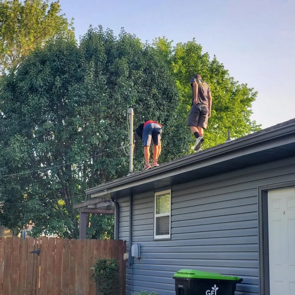 Slide of Top Peaks Roofing & Construction