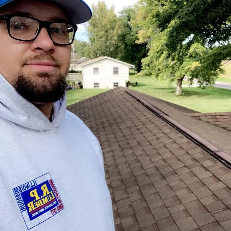 Slide of Top Peaks Roofing & Construction