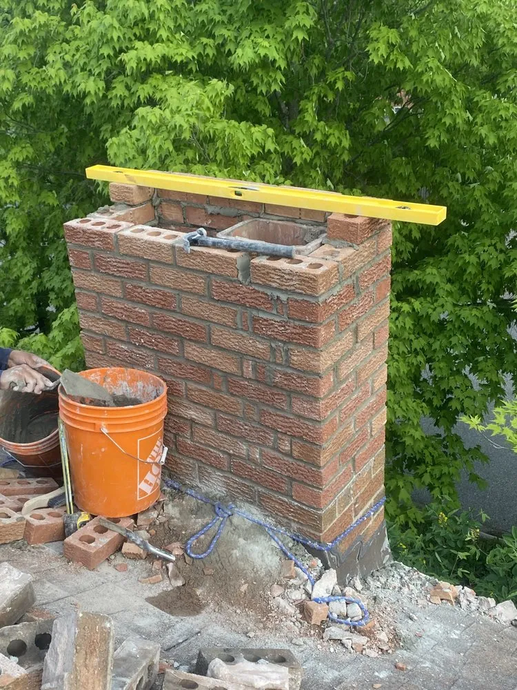 Slide of Top Rank Roofing and Masonry