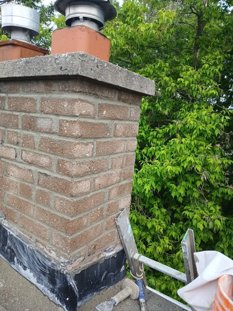 Slide of Top Rank Roofing and Masonry