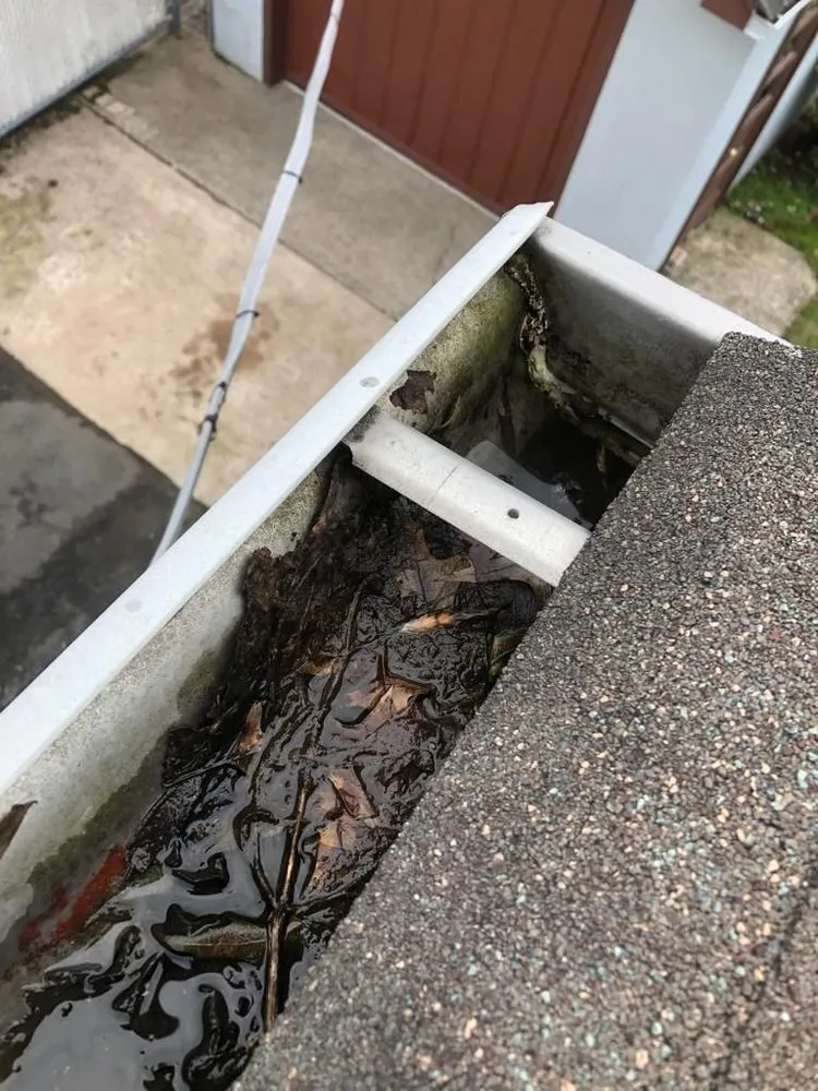 Slide of Top Ridge Roofing