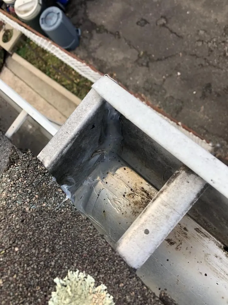 Slide of Top Ridge Roofing