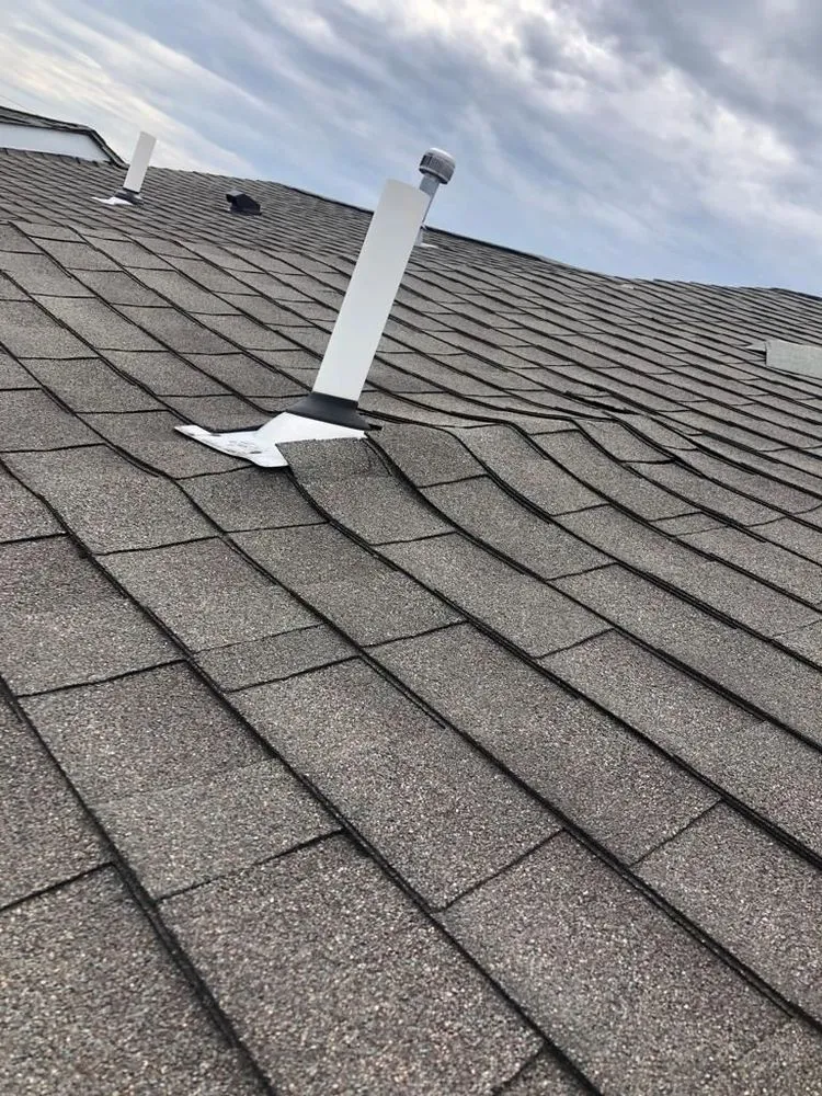 Slide of Top Ridge Roofing