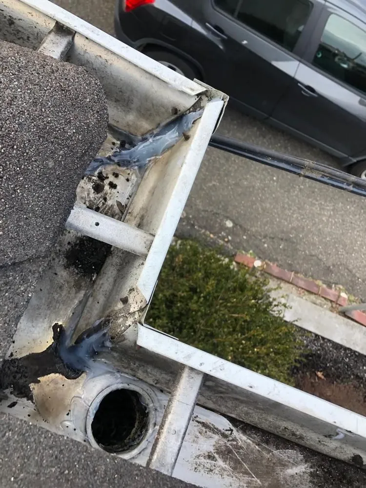 Slide of Top Ridge Roofing