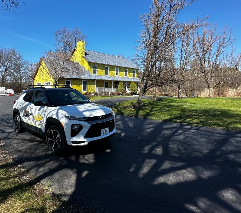 Slide of Top Roof Contractors