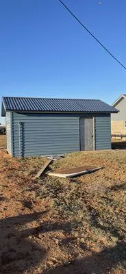 Top Roofing & Construction Logo