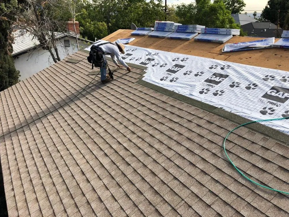 Slide of Top Roofing Inc