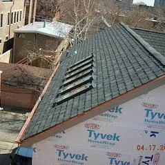 Slide of Top Team Roofing