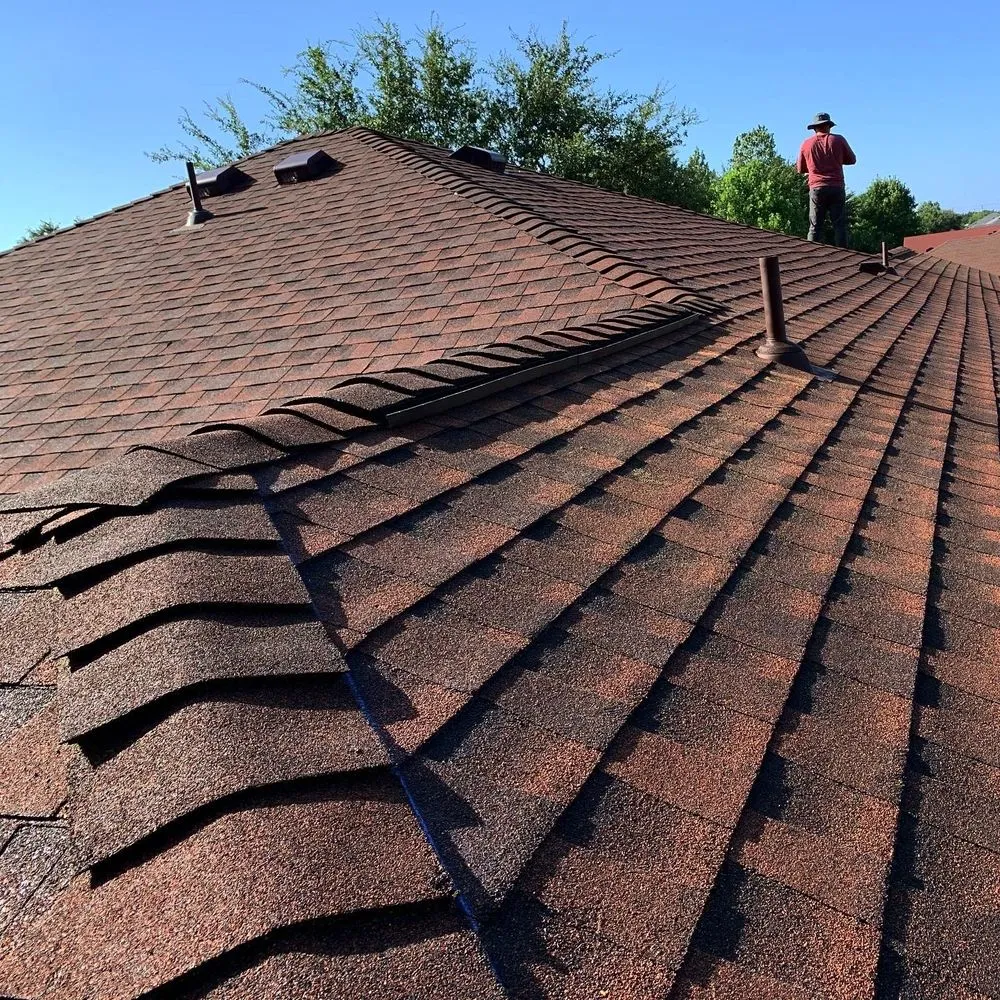 Slide of Top Tier Roofing