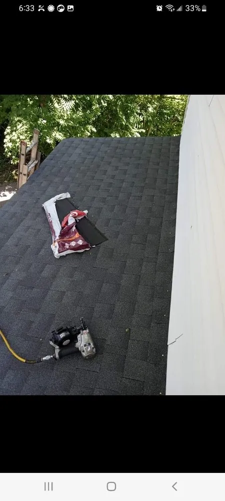 Slide of Top Tier Roofing