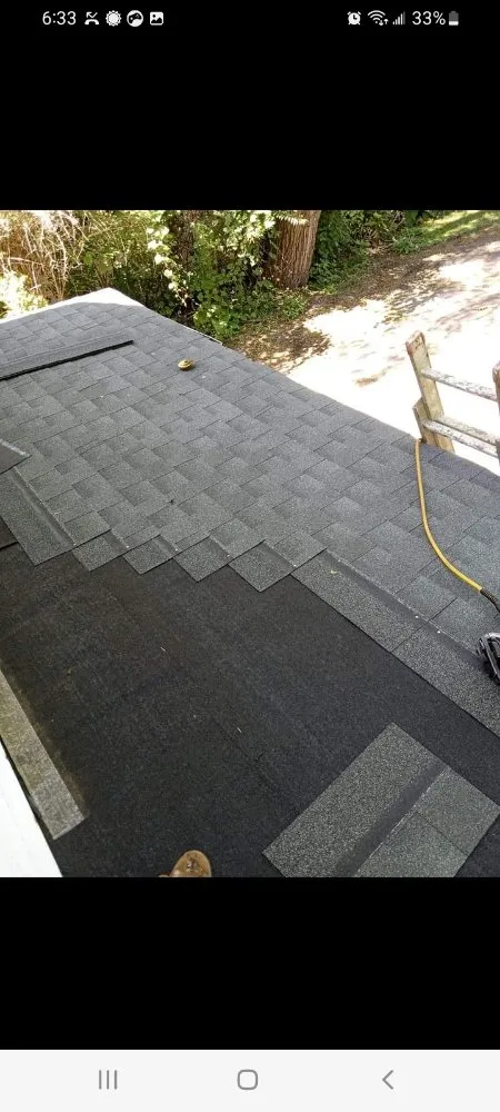 Slide of Top Tier Roofing