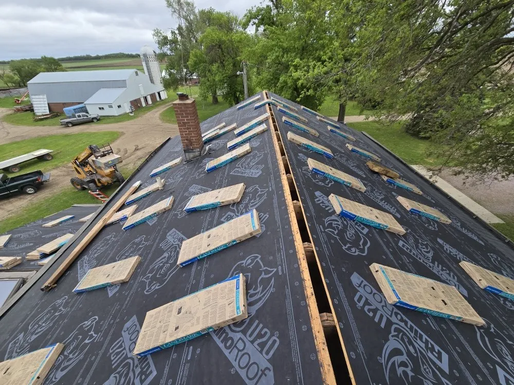 Slide of Top Tier Roofing