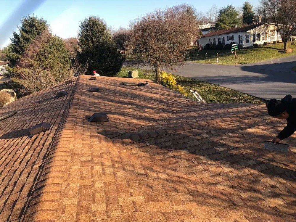 Slide of Top Tier Roofing