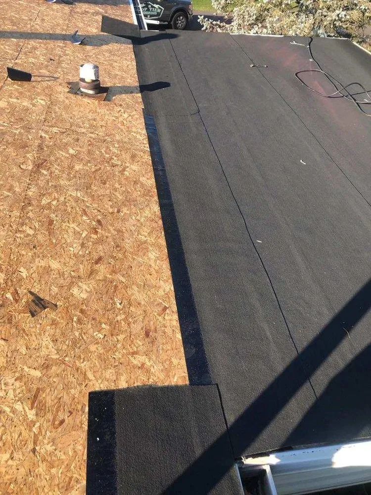 Slide of Top Tier Roofing