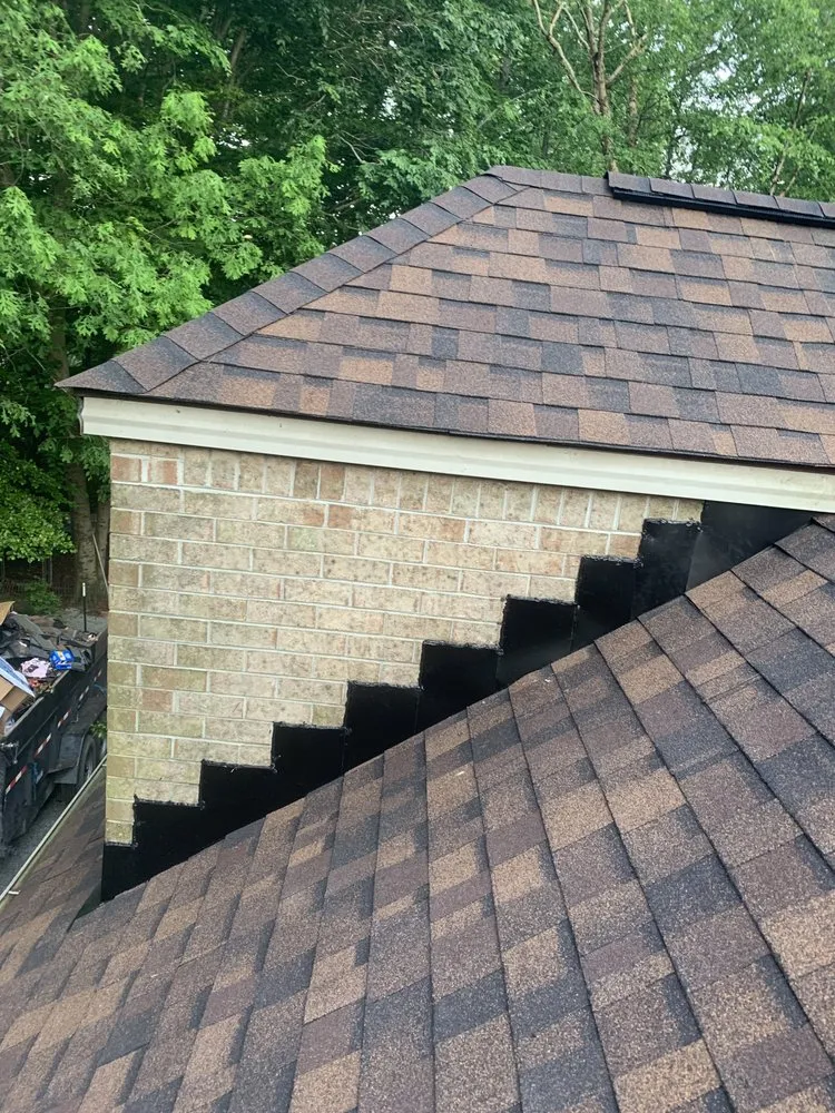 Slide of Top Tier Roofing