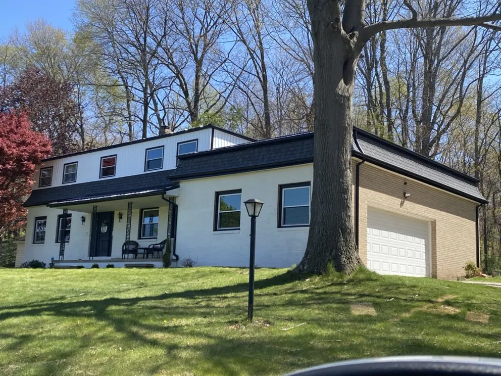 Slide of Top to Bottom Exteriors