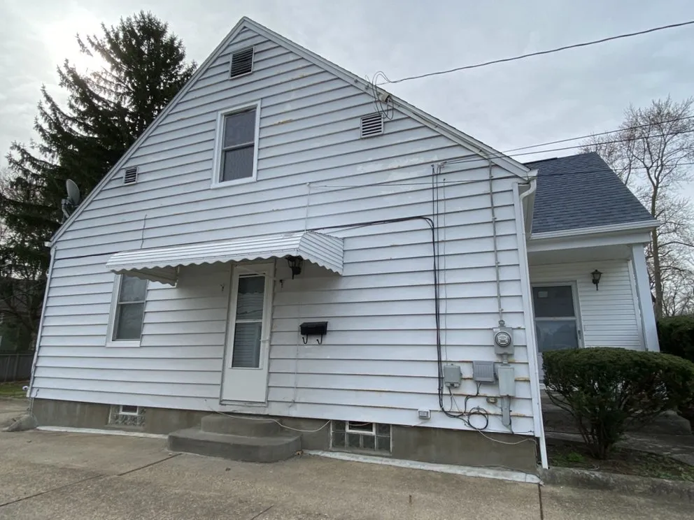 Slide of Top to Bottom Exteriors