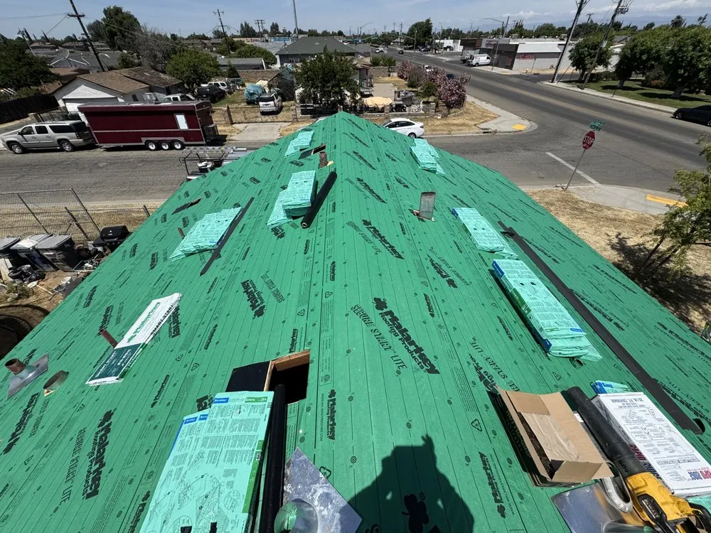 Slide of Top Valley Roofing
