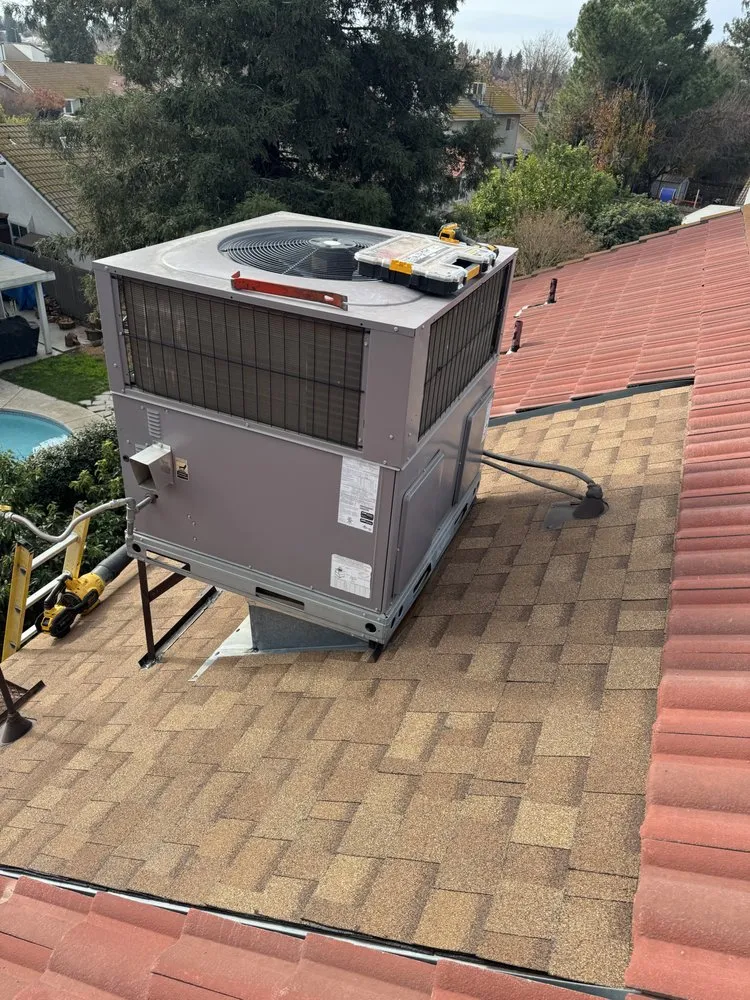 Slide of Top Valley Roofing