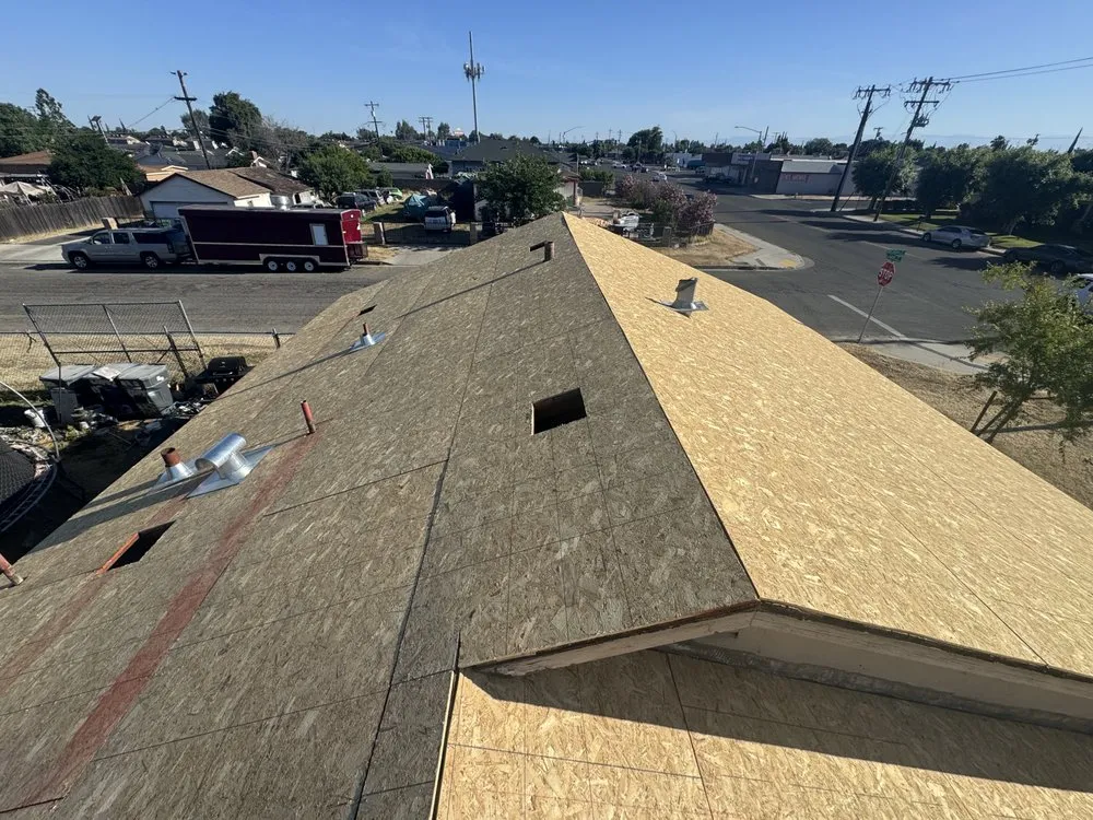 Slide of Top Valley Roofing