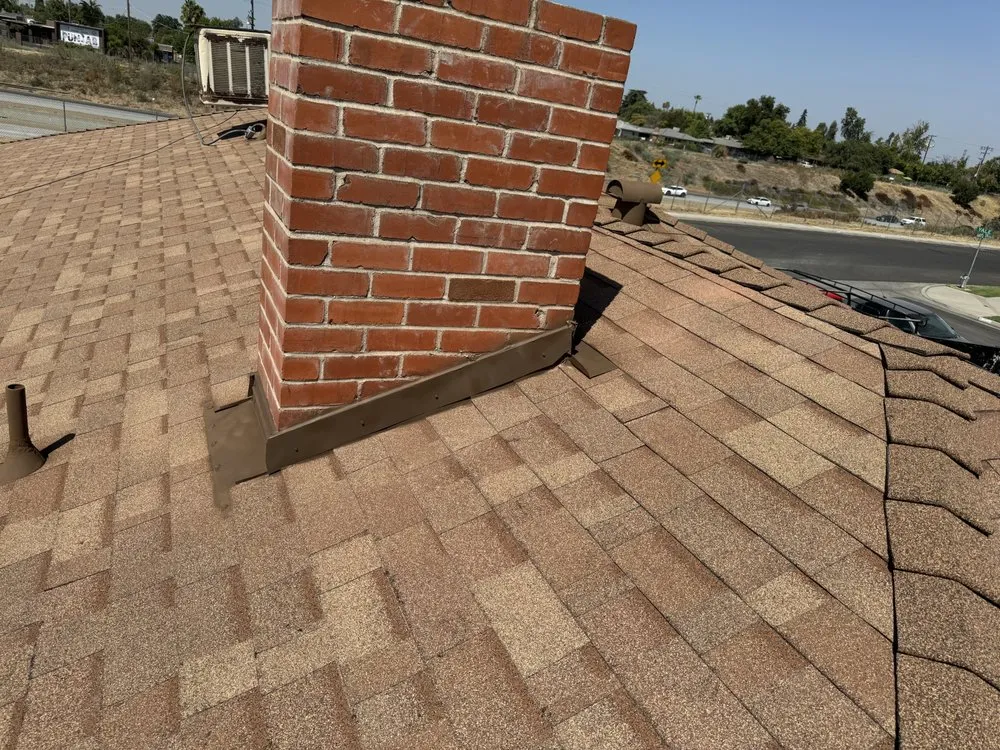 Slide of Top Valley Roofing